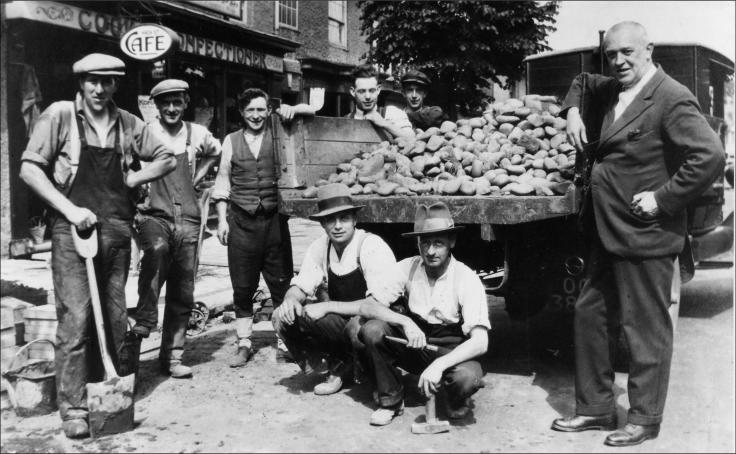 Taking up the cobblestones from the High Street in the 1930s.