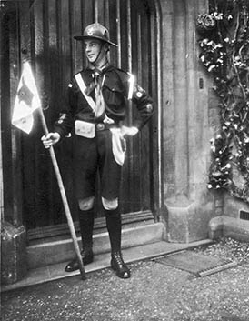 Harvey Watts in Scout Patrol Leader uniform outside KN vicarage