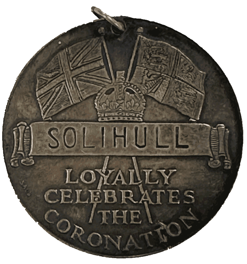 Coin-shaped bronze-coloured medal depicting a crown surmounted by a Union flag and Royal Standard, with a scroll in the centre on which is written Solihull. Beneath the scroll is the text "loyally celebrates the Coronation."